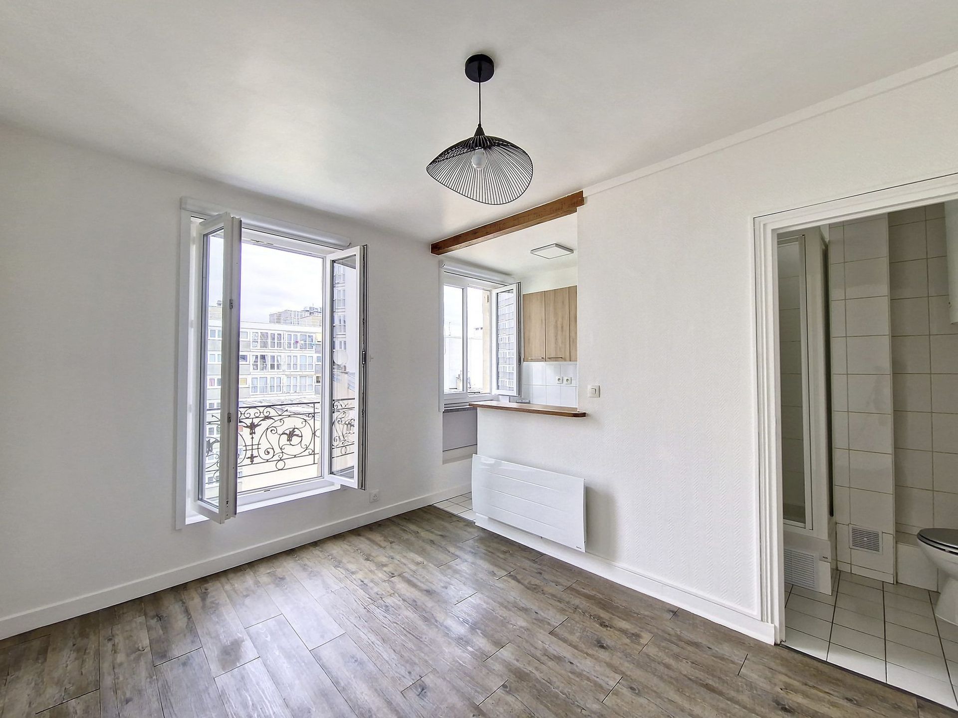 ef5f76e7-dd7a-483b-88b7-4c8cab72e488-23689-0.jpg Bien exposé studio de 18m² – Vue dominante dans le 19ème